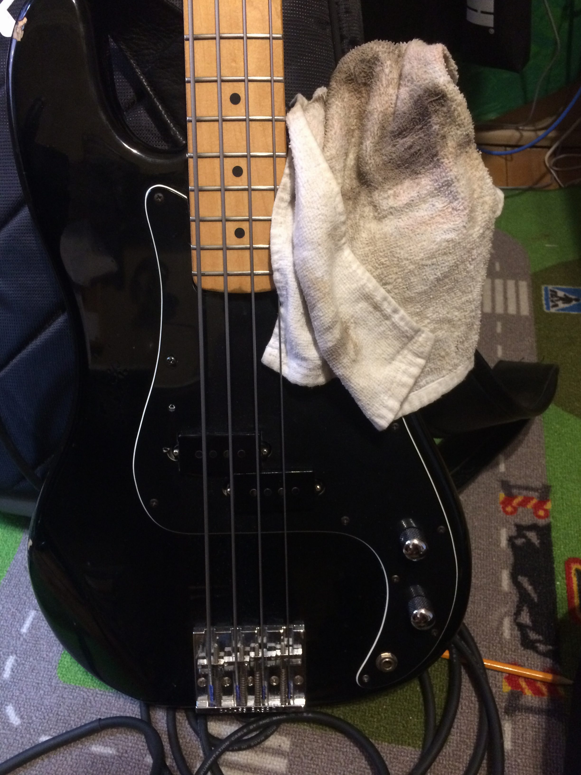 cleaning bass with cloth