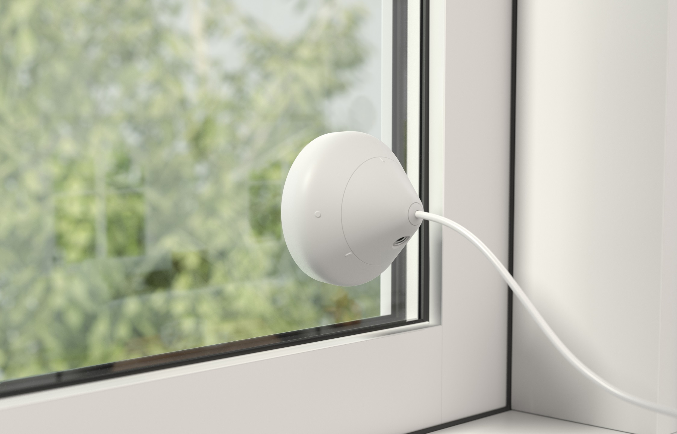 Logitech Circle 2 mounted in a window facing the outdoors.