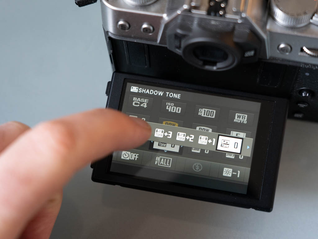 A photo of the Fujifilm X-T30 touchscreen in use