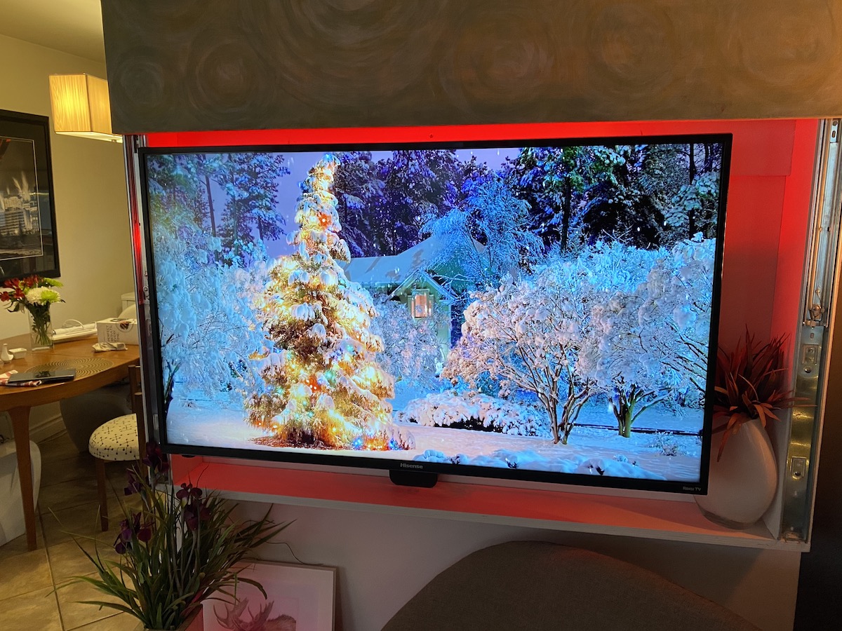 LIFX Z TV light strip shining red light behind a tv