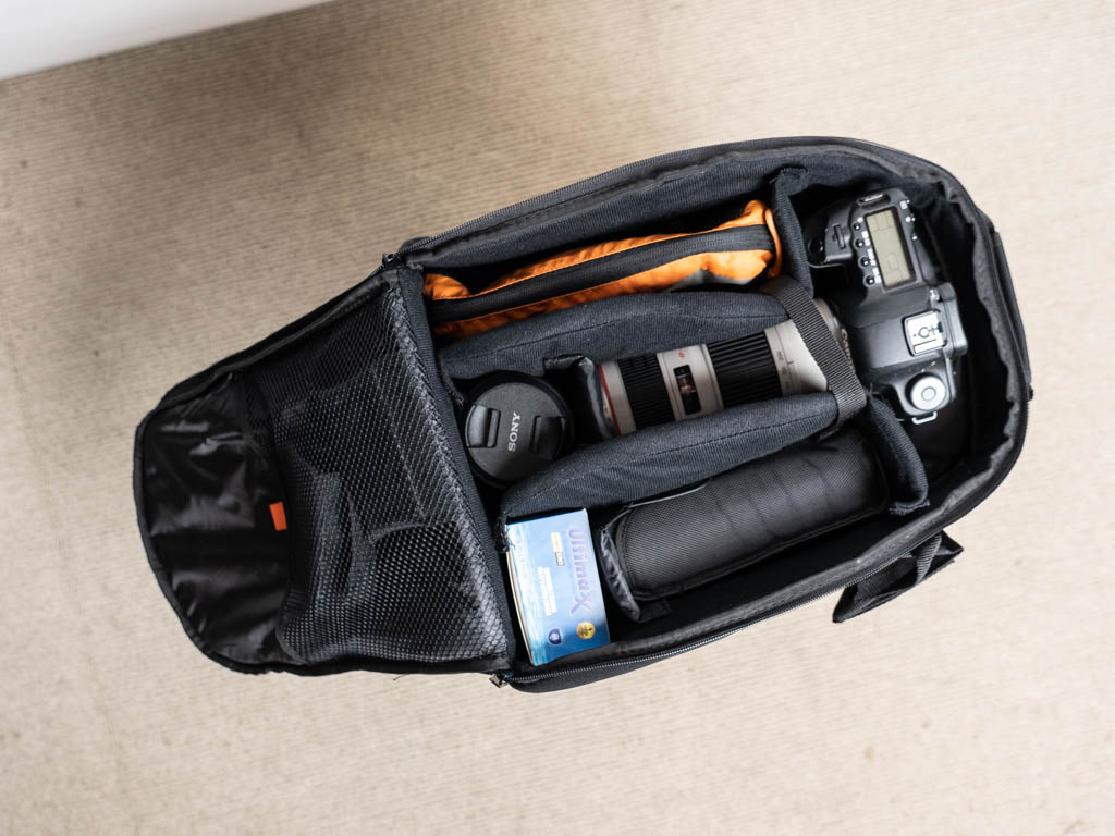 A photo of the interior of the Ultimaxx medium-sized backpack with camera gear