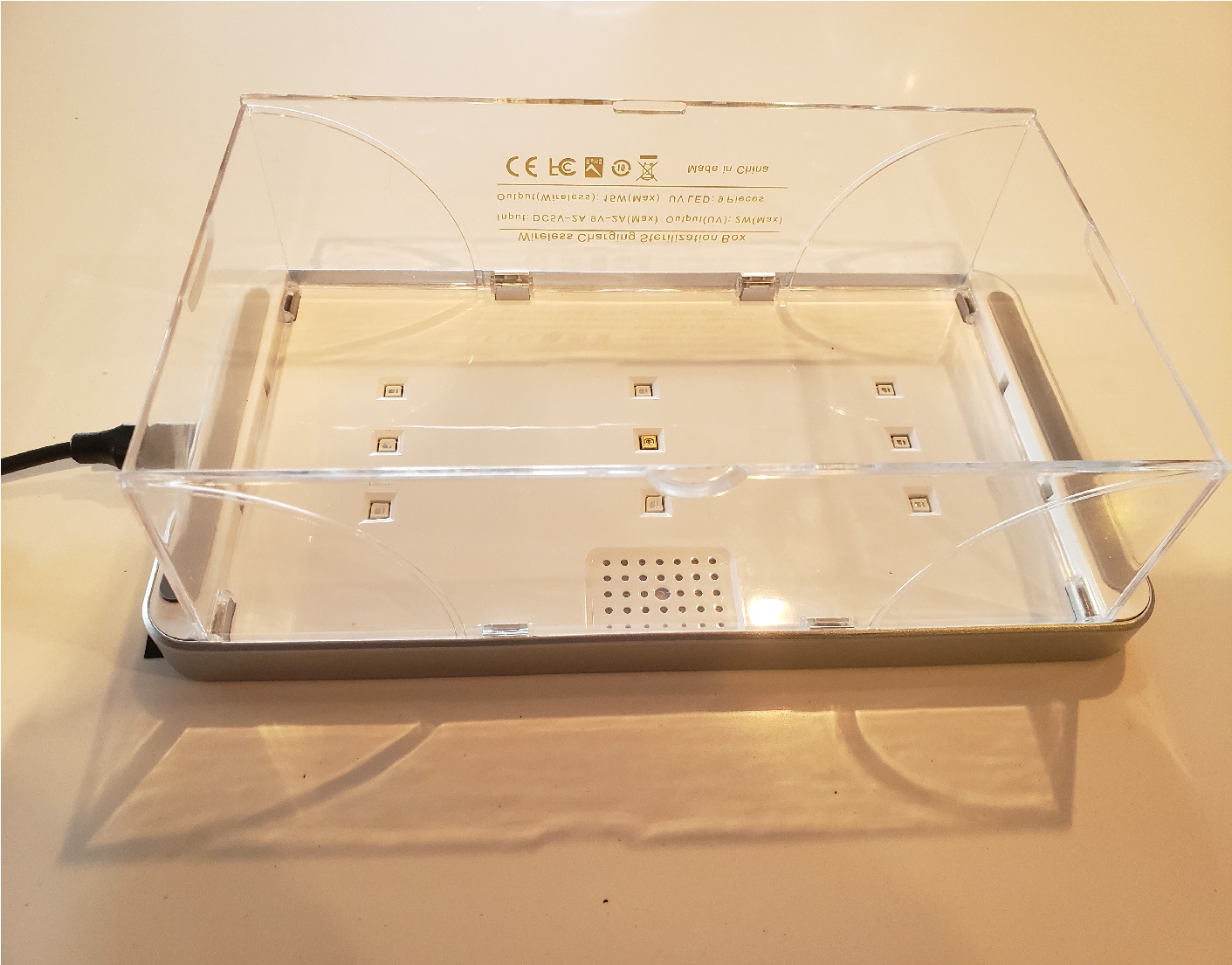 image of the underside of the UV sterilizer box with the box sides expanded
