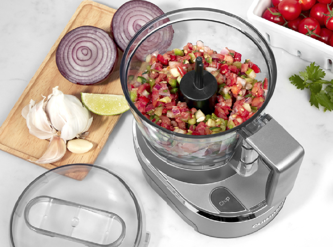 image of the Cuisinart Cordless Food Chopper filled with ingredients for salsa, and more ingredients nearby