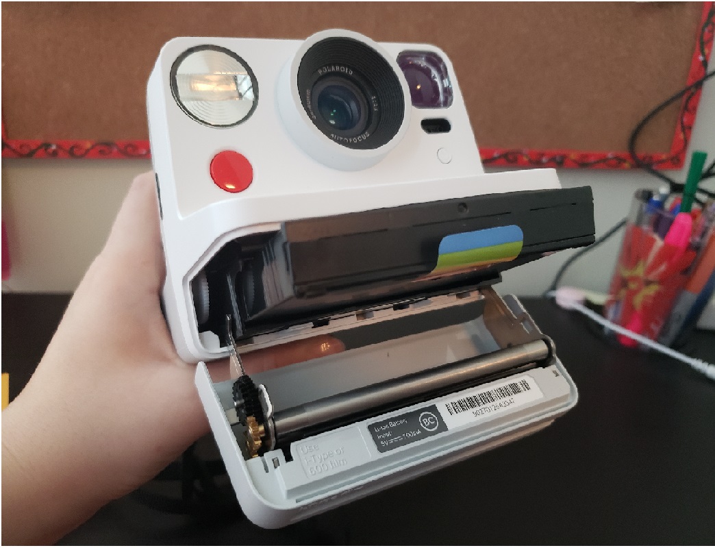 image of the Polaroid Now with the film compartment open