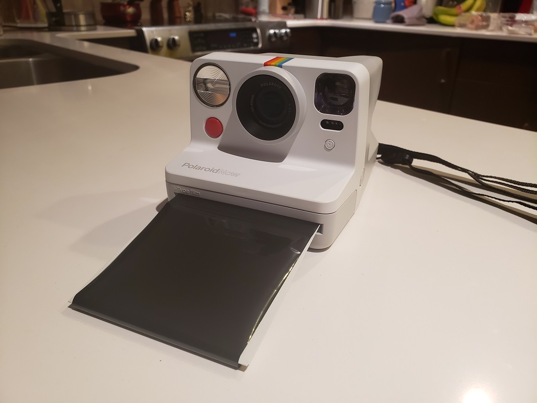 image of the Polaroid Now with film shield ejected