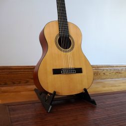 The JC-23 is a 3/4 classical guitar