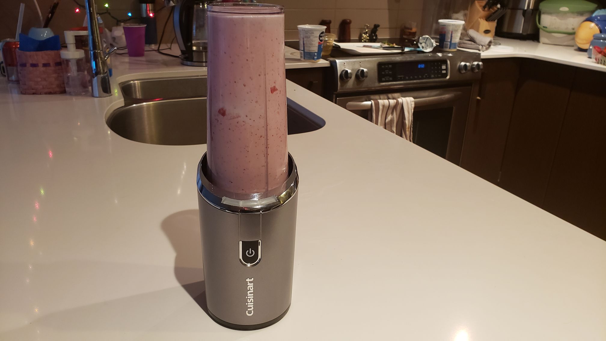 image of the blender full of strawberry smoothie