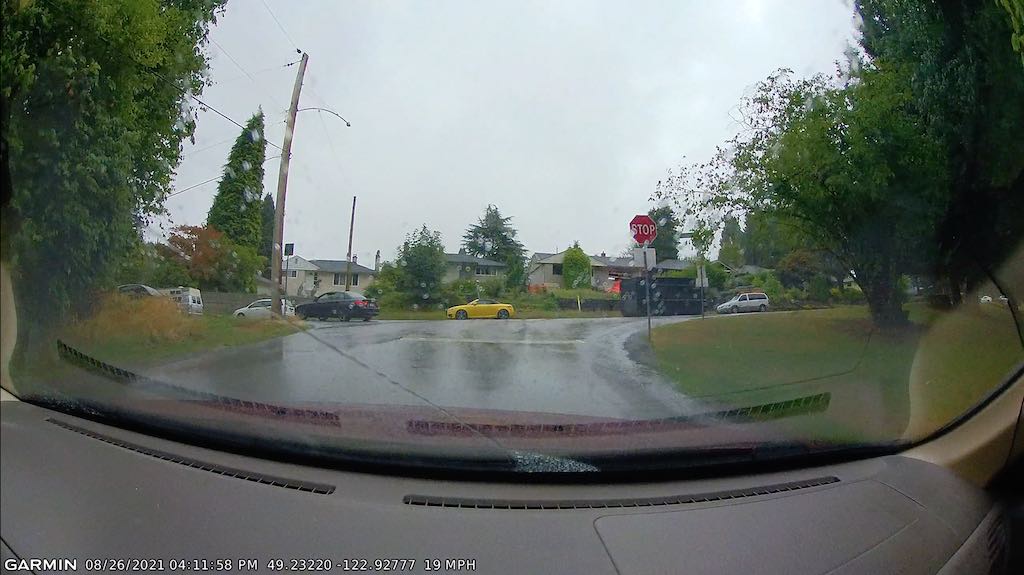 Shown is a daytime screen capture taken in the rain with the Garmin 67W Dash Cam