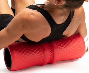 Woman with a foam roller