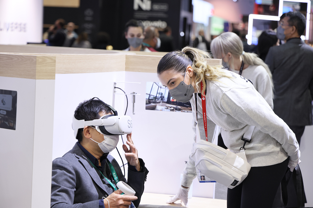 A man wearing a VR headset at CES 2022