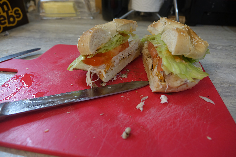 A sandwich cut in half with the Cuisinart utility knife