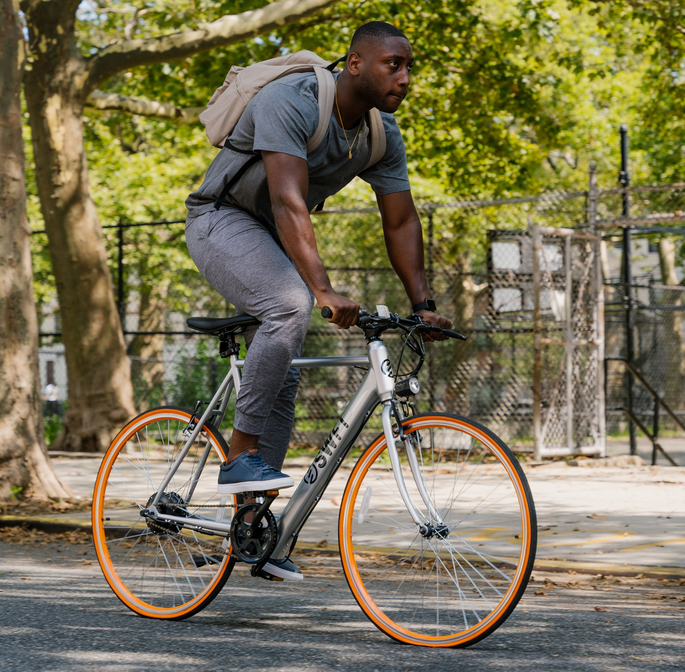 A man riding a Swft electric bike