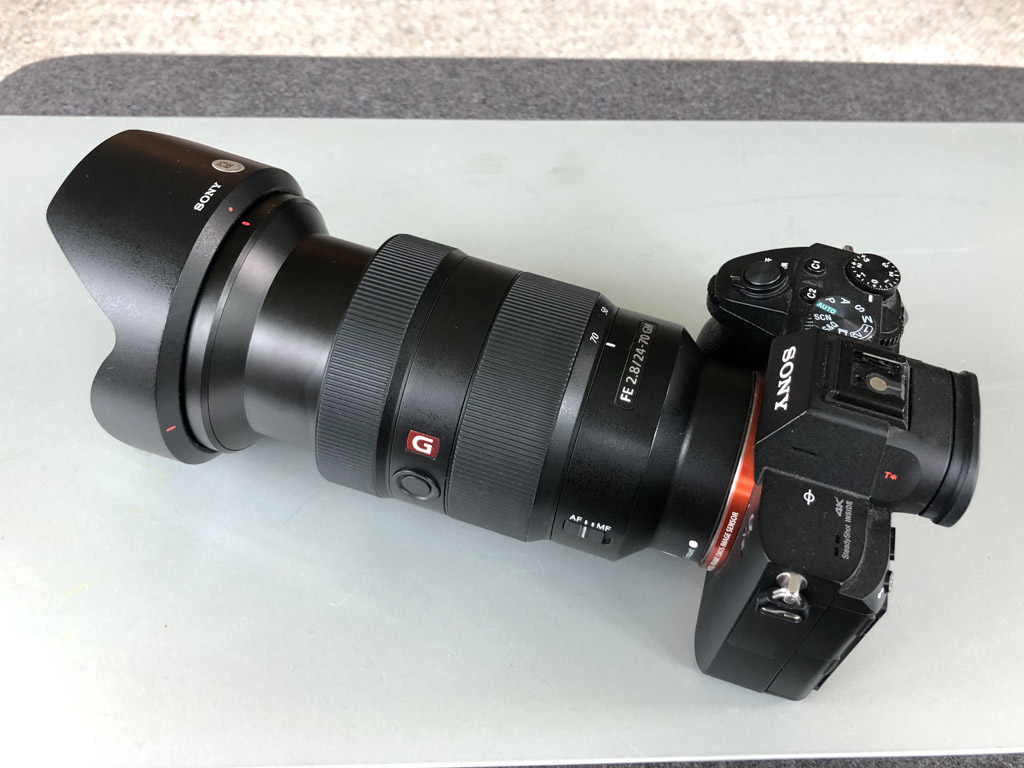 A photo of the Sony 24-70mm f/2.8 GM lens mounted on a Sony A7 III and fully extended