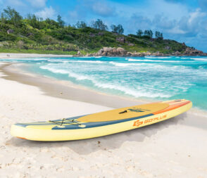 Image of paddle board on the beach 