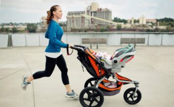 Woman pushing a stroller while going for a jog