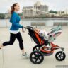Woman pushing a stroller while going for a jog