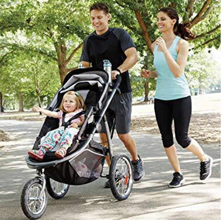 Parents with baby in Belelelo jogging stroller