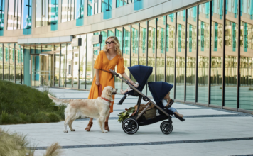 Mom and baby and dog with Cybex Gazelle convertible stroller