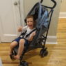 guzzie and guss lightweight stroller with child