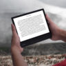 Person reading on Kobo Forma in landscape orientation.