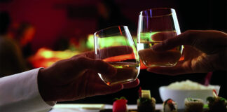couple clinking wine glasses