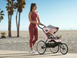Mom in active wear with baby in stroller