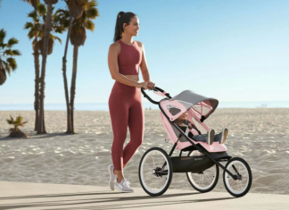 Mom in active wear with baby in stroller