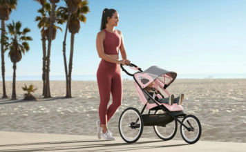 Mom in active wear with baby in stroller