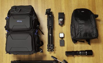A photo of some Ultimaxx camera gear laid out on a wooden floor