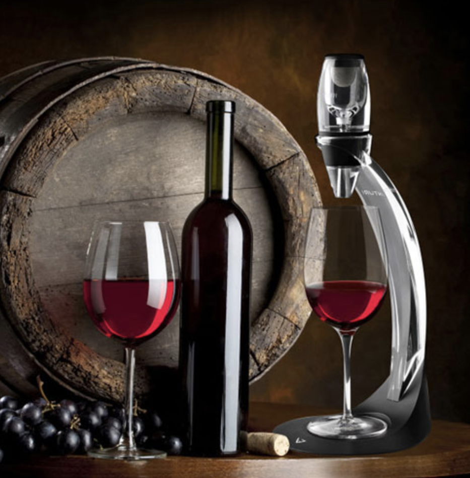 wine aerator with two glasses of wine.