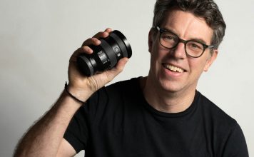 A photo of photographer Justin Morrison holding the Sony FE 24-105mm G OSS lens