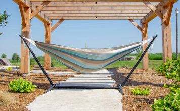 image of a free-standing hammock under an awning