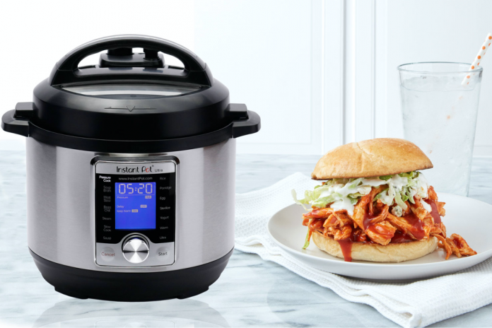 Instant Pot with pulled chicken sandwich