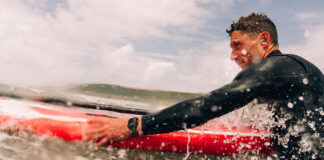 Man surfing while wearing an Apple Watch Series 10