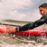 Man surfing while wearing an Apple Watch Series 10
