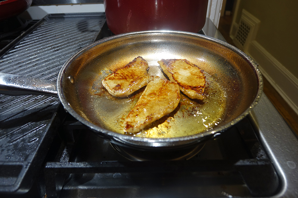 Cuisinart nesting cookware pork chops.