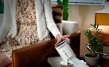 Woman setting up portable projector