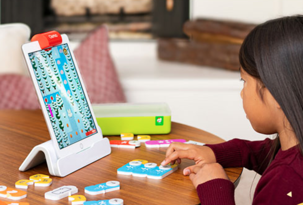 Child with Osmo Learning Kit