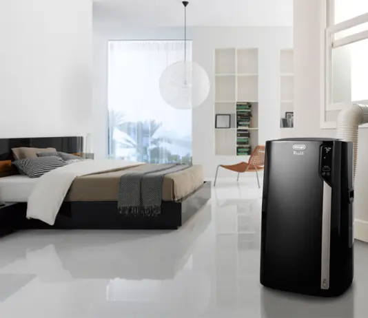 Delonghi 4-in-1 Portable Air Conditioner in bedroom