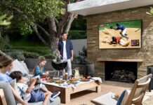 Family outside with Samsung The Terrace TV