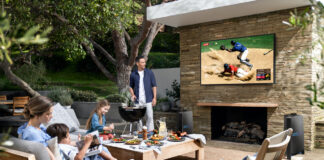 Family outside with Samsung The Terrace TV