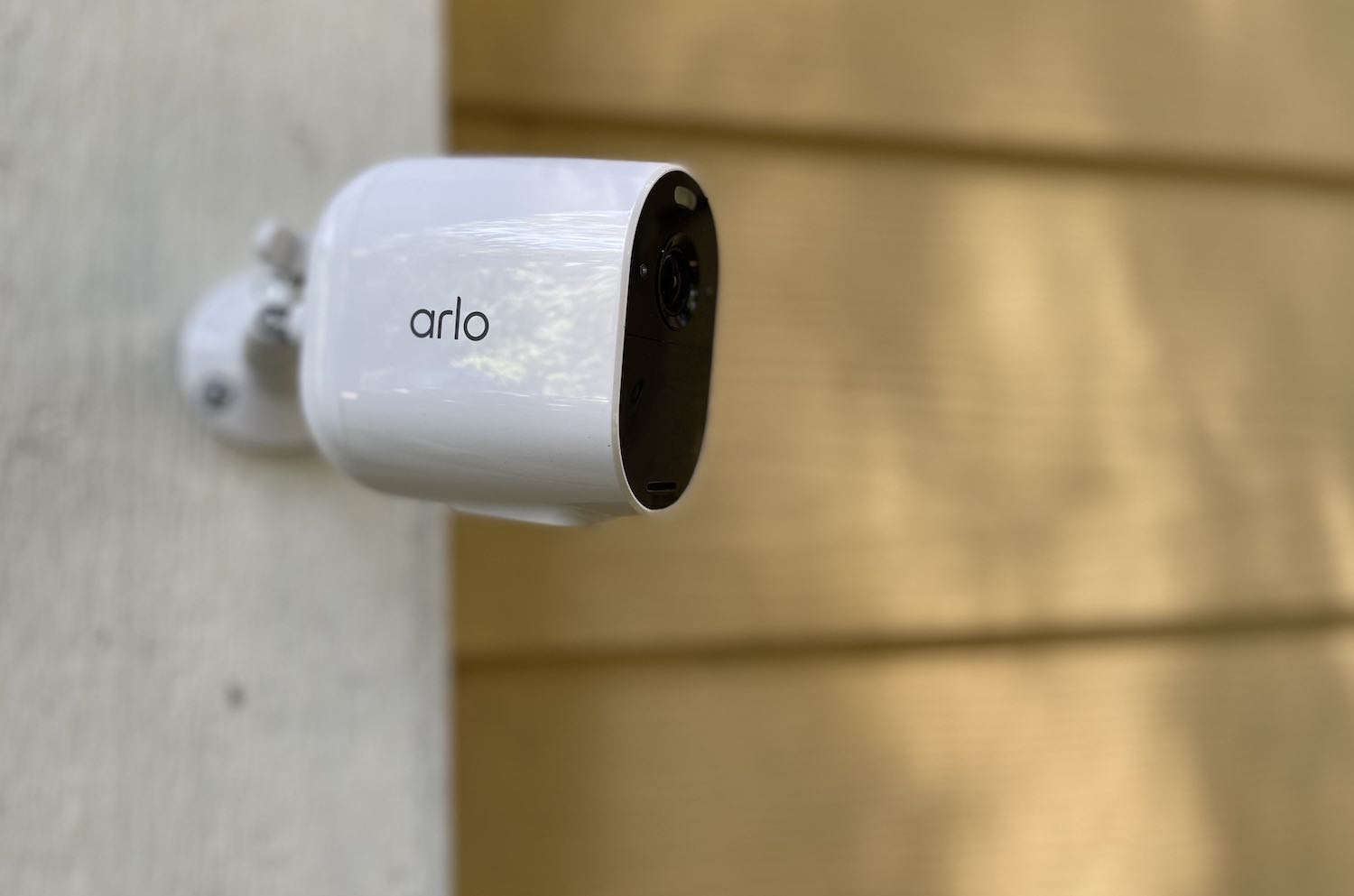 How do I charge my Arlo Essential wire-free camera?