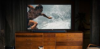 BOSE Soundbar home theater speaker display with surfing footage