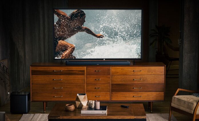 BOSE Soundbar home theater speaker display with surfing footage