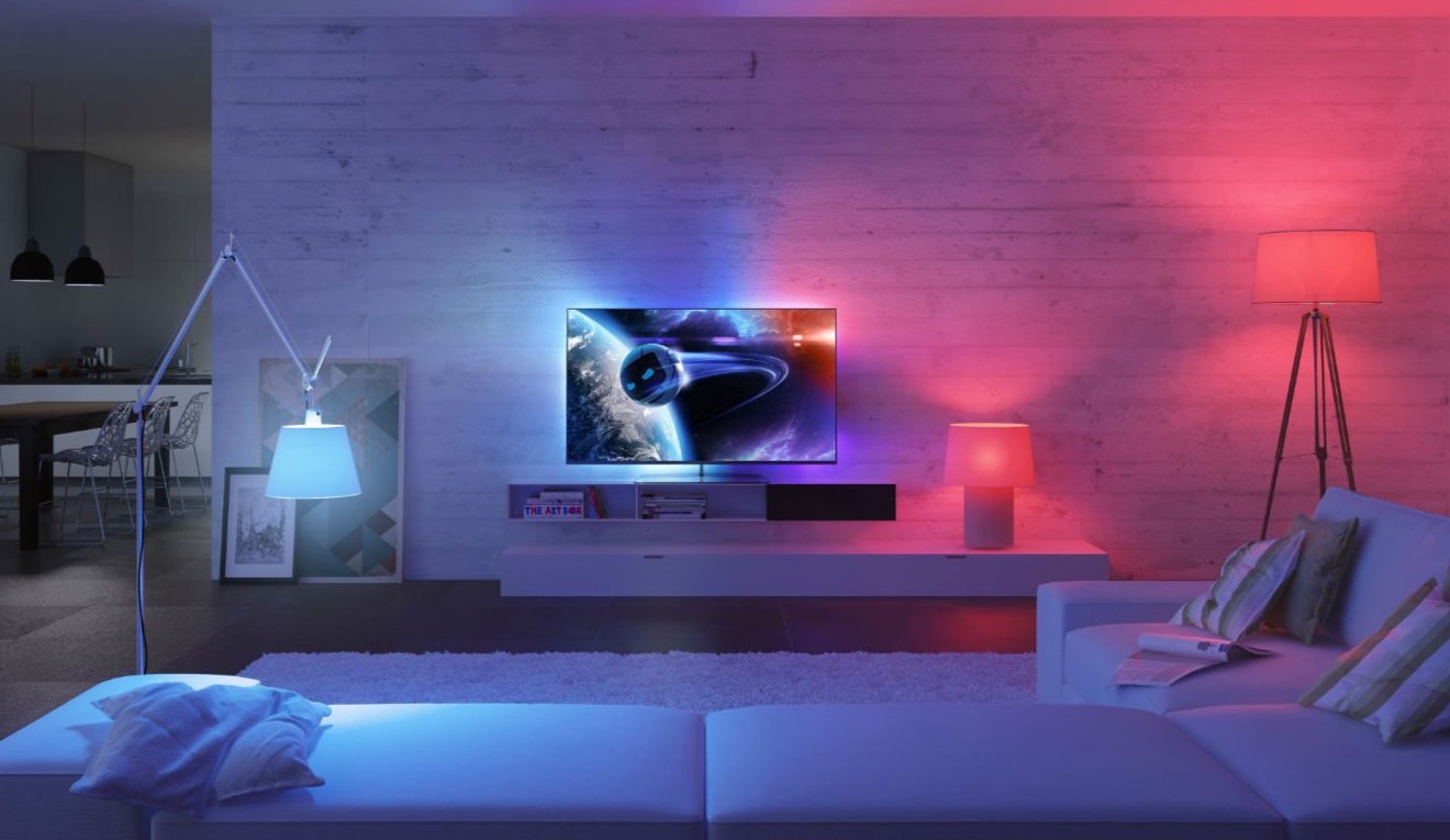 Phillips Hue lights behind and next to a smart TV for an immersive watching experience