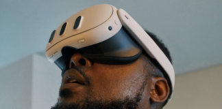 A guy wearing the Meta Quest 3 VR headset.