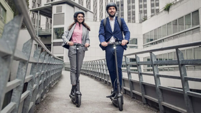Segway scooter with two people
