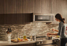 Woman cooking with an electric stove