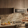 Woman cooking with an electric stove