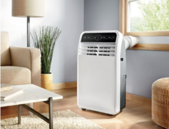 Insignia portable air conditioner cools down living room. 
